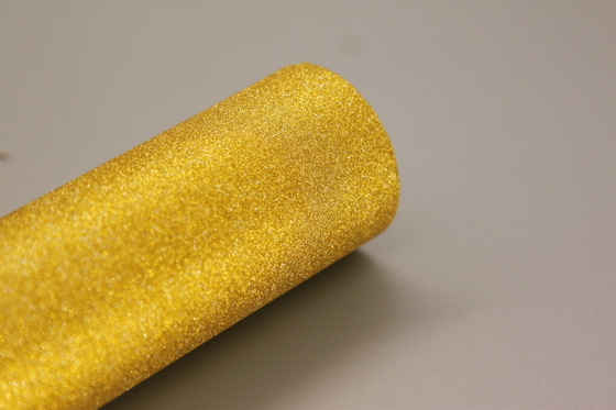 อัพเกรดวัสดุธุรกิจของคุณด้วย Glitter Lamination Film ปรับปรุงผลกระทบกระจ่างกระจ่างสําหรับการเสร็จหรู